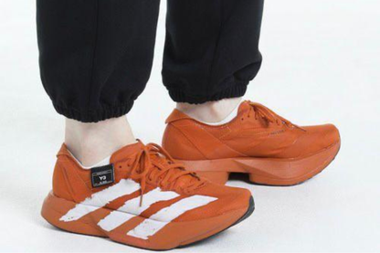 Adidas Pro 4 in Brick Red / Core Black