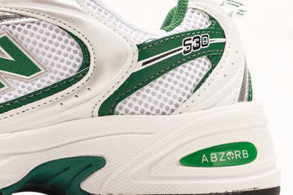 New Balance 530 White and Nightwatch Green colorway